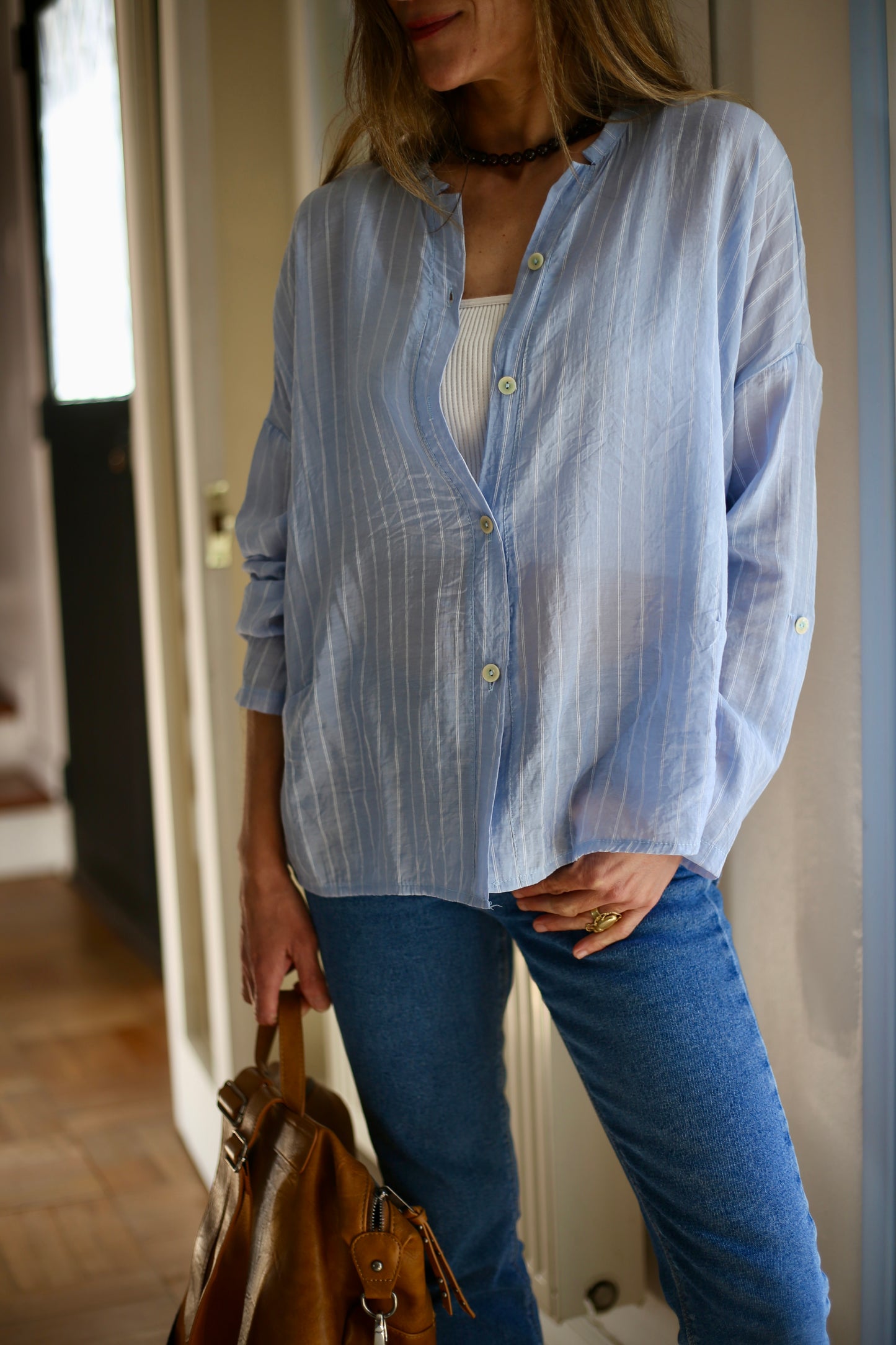 BLUSA SARITA RAYAS CELESTE.