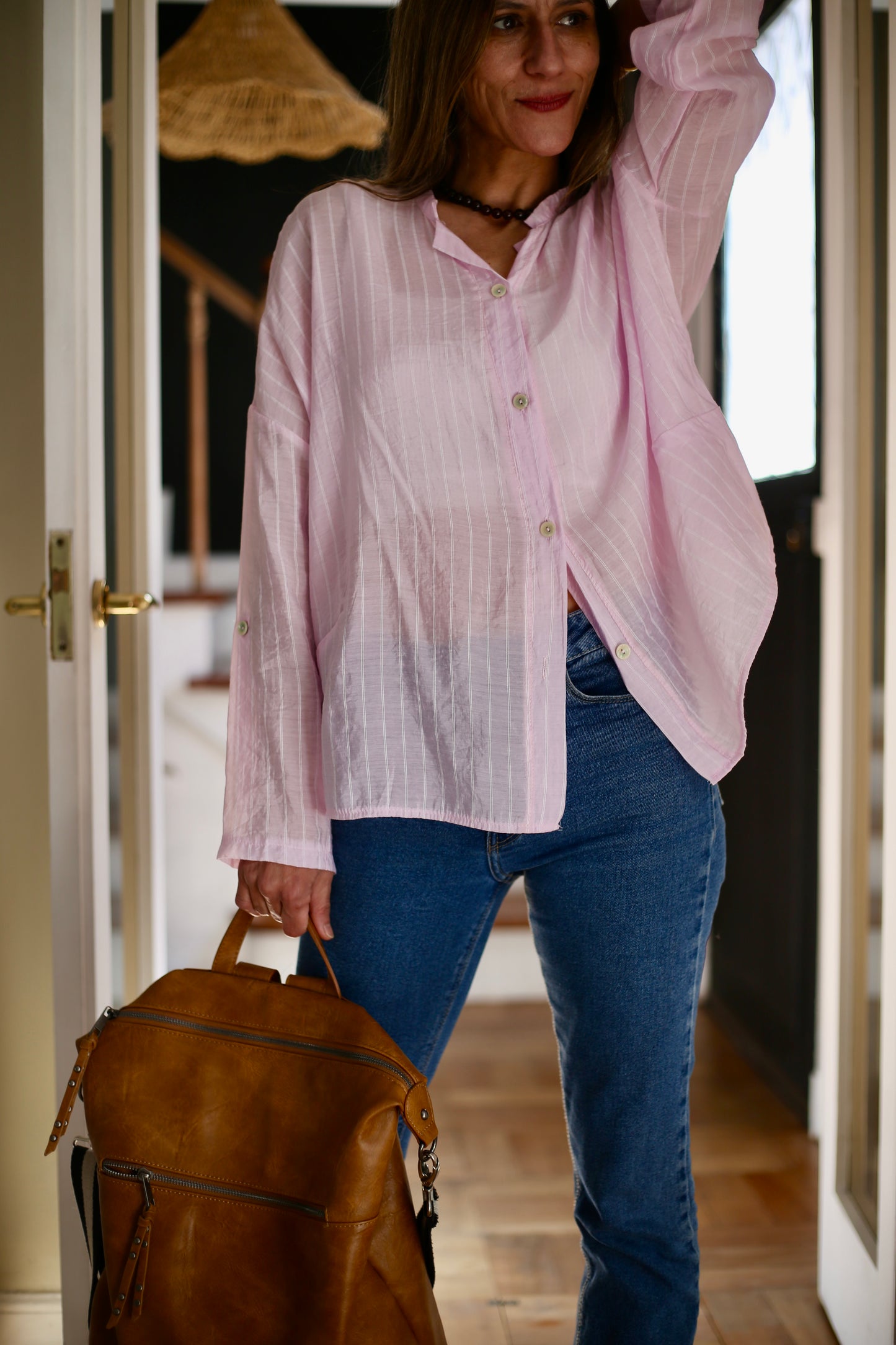 BLUSA SARITA RAYAS ROSADA.