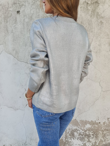 CHALECO METALIZADO GRIS/PLATEADO.